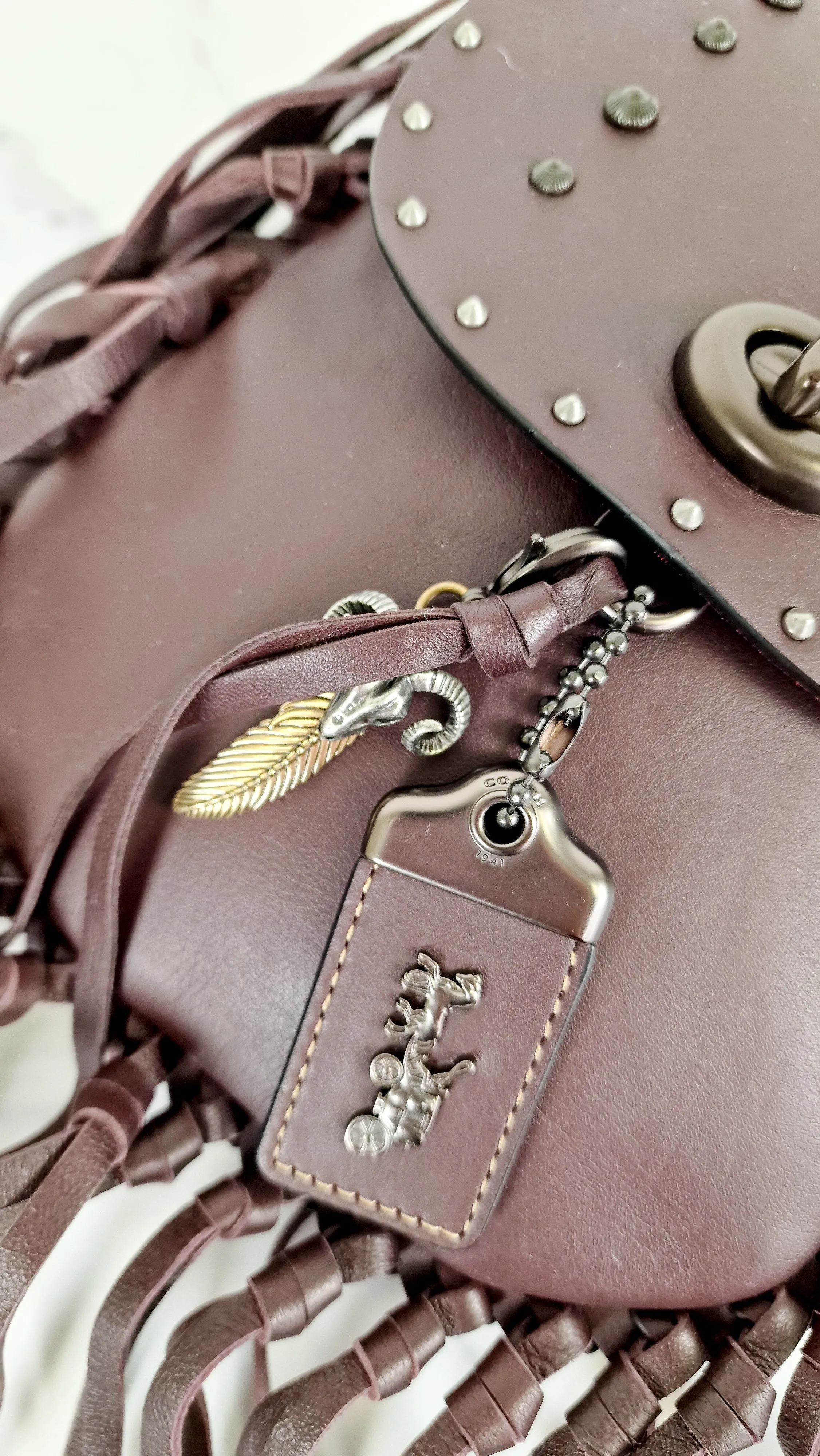 Coach 1941 Fringe Saddle Bag with Pyramid Rivets in Oxblood Smooth Leather & Ram Charm - Coach 48617